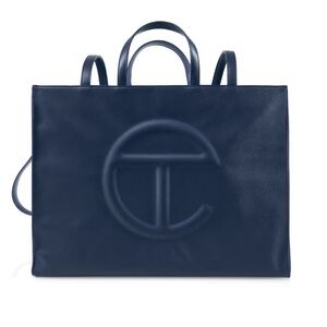 Telfar navy medium shopping bag. Brand new. With tags, dust bag,